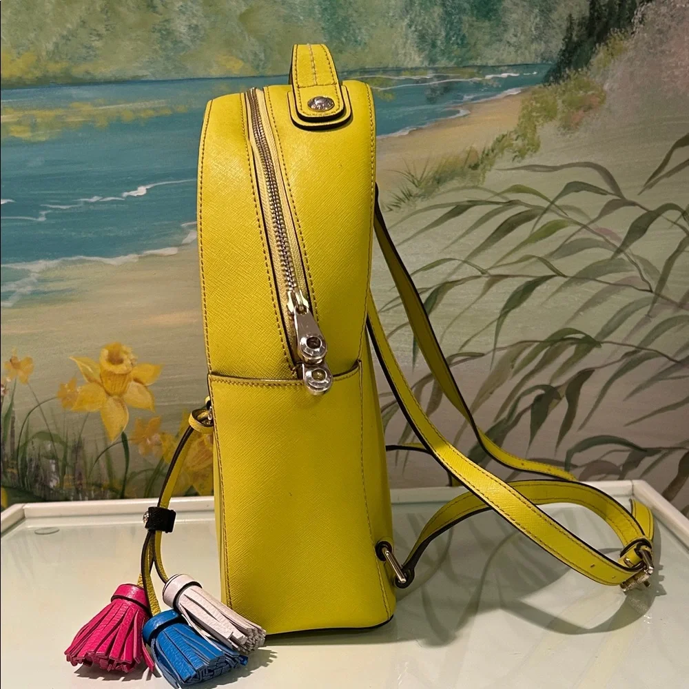 Henri Bendel West 57th Yellow Saffiano Leather Backpack with Colorful Tassels